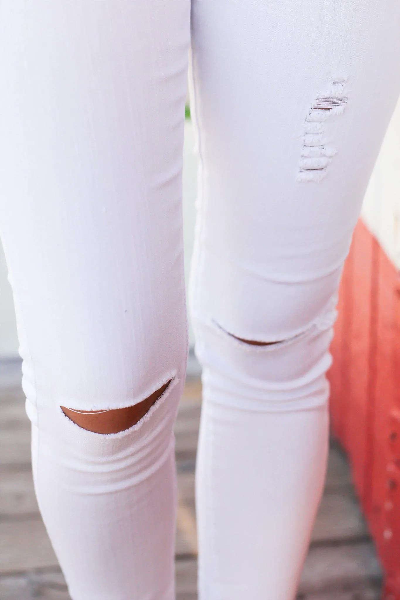 White Distressed Jeans with Released Hem